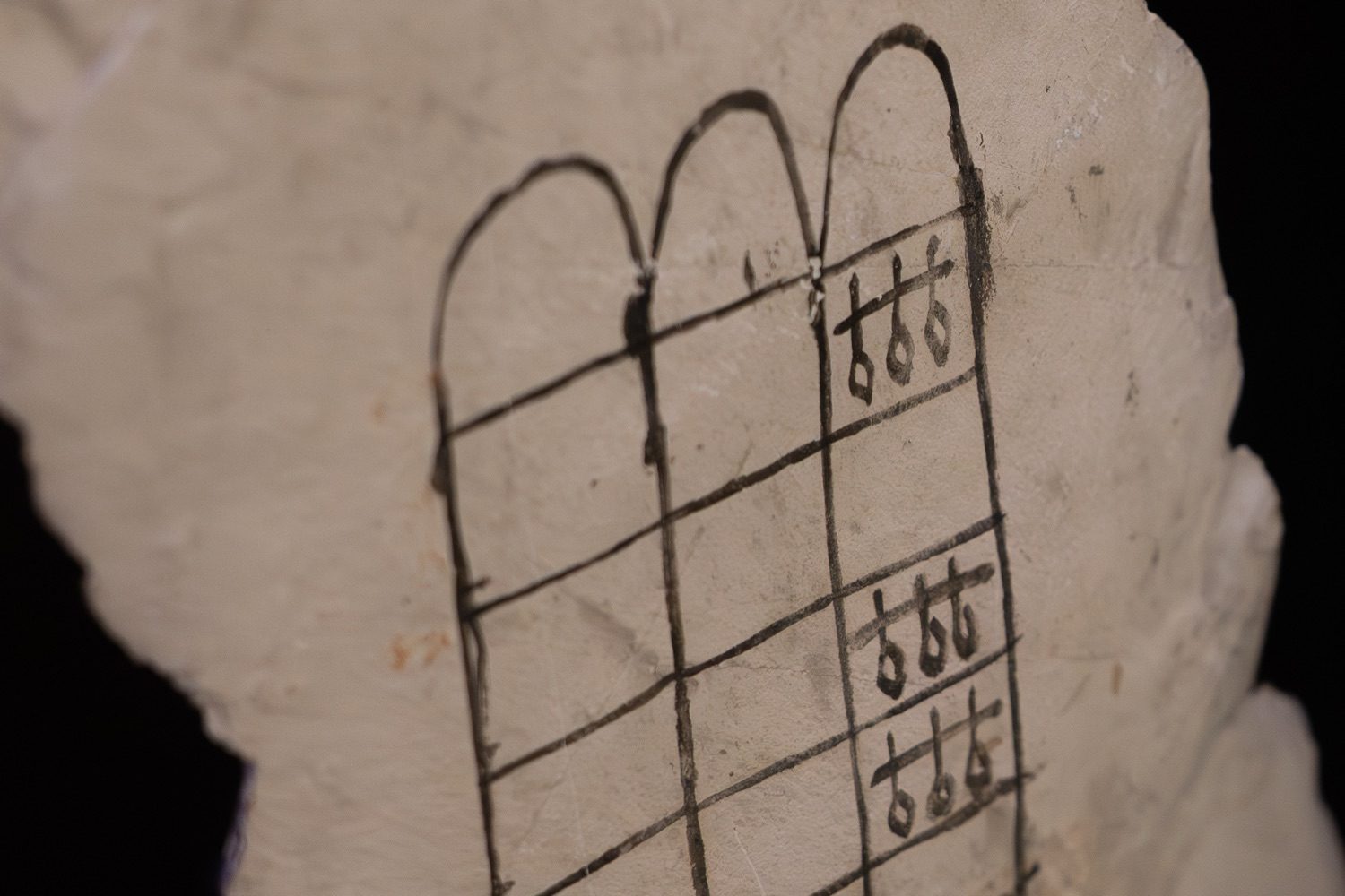 A Senet board drawn in ink on a limestone ostracon from Deir el-Medina.